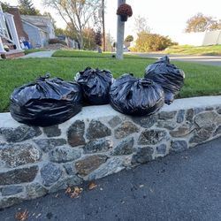 (4) large trash bags full of men’s clothing