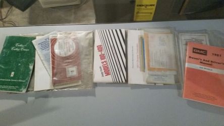 3 different 70's car owner manuals
