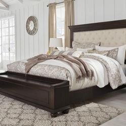 Brynhurst Dark Brown King Upholstered Storage Bed


