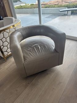 RH DREW CURVED LEATHER SWIVEL CHAIR
