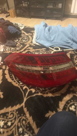 AI Overview                This is a left LED tail light lamp assembly for a 2010-2013 Mercedes-Benz E-Class W212 sedan