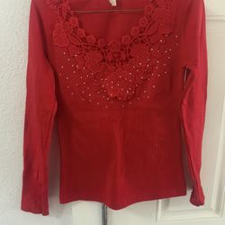 Red Shirt With Pearls.