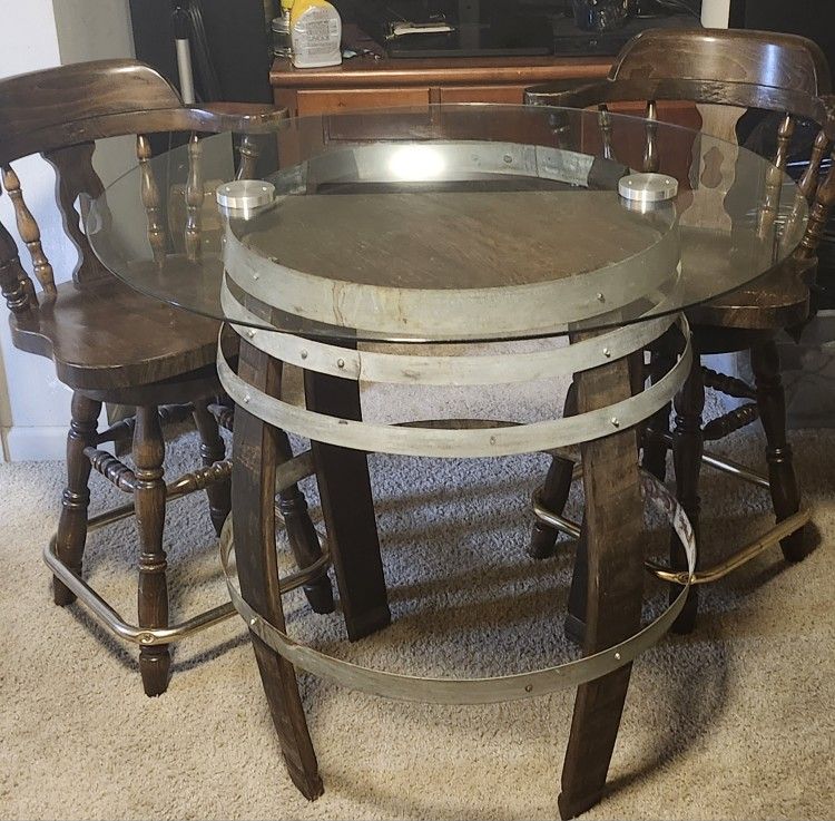 Barrel Table And Two Chairs