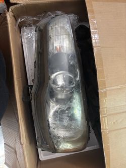 Stock Mitsubishi Lancer headlights