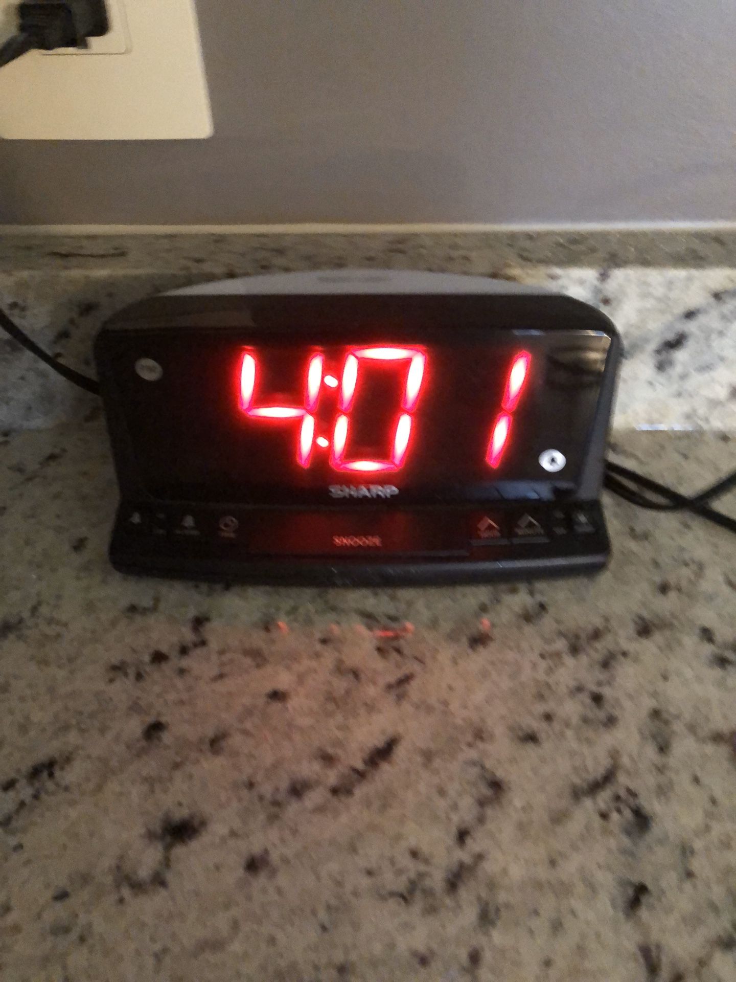 Sharp alarm clock with night light