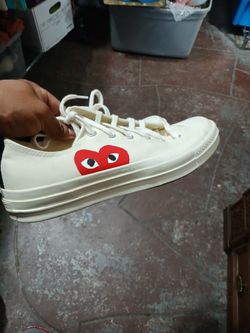 pair of Comme des Garçons PLAY x Converse Chuck 70 Low