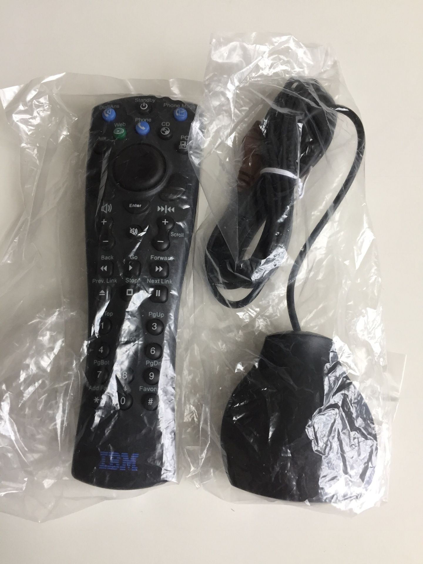 IBM multifunctional remote control. IBM mouse signal receptor? Never used. Still sealed in original packagings.