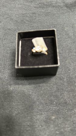 Ravishing women yellow gold tone stainless steel ring .
