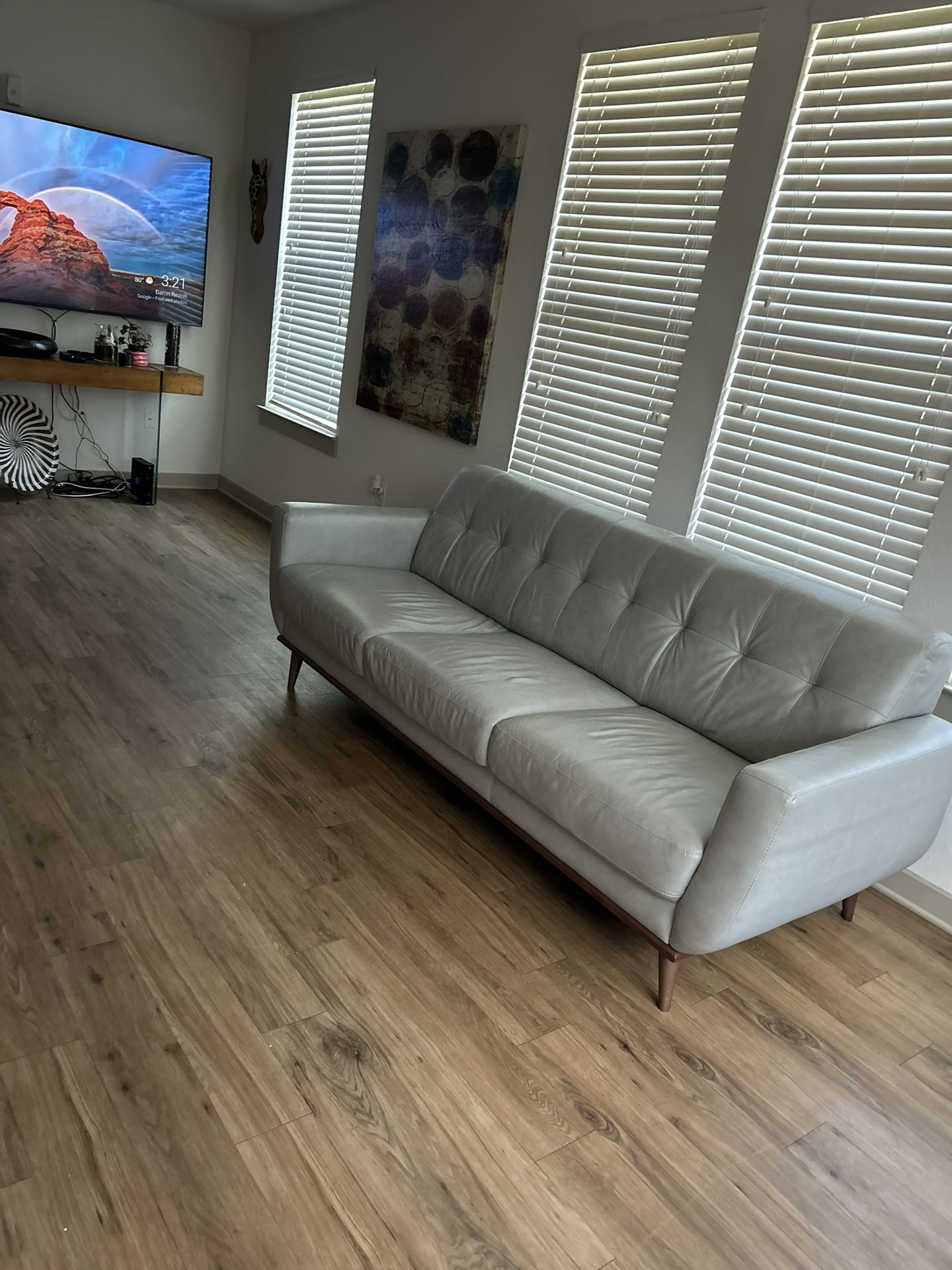 Gray Leather sofa Cushions are permanent