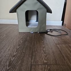 Small dog house with Bed warmer.