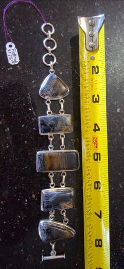Sterling silver bracelet with polished Pietersite gemstones and toggle clasp