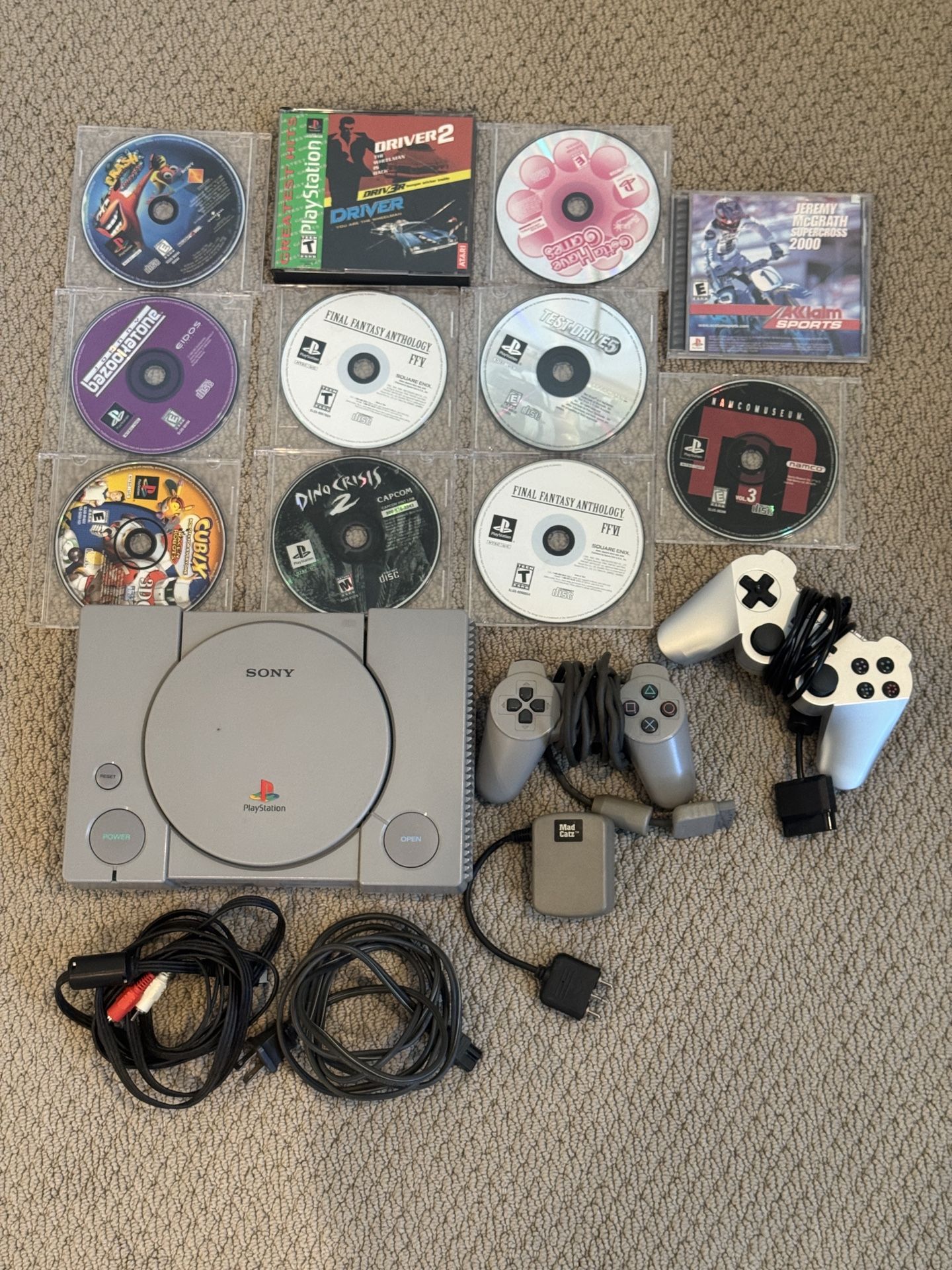 PlayStation 1 Console — 2 Controllers + 11 Games
