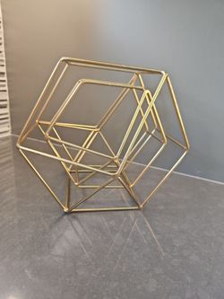 Gold metal hexagonal decorative piece