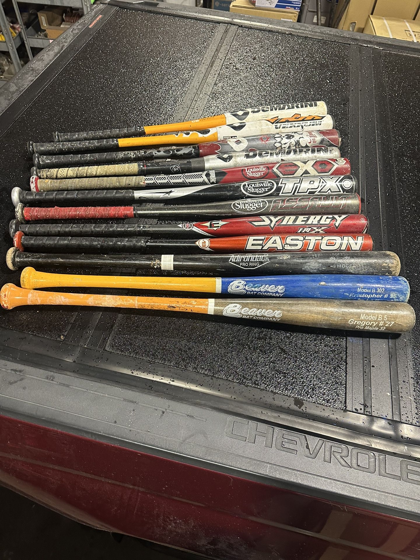 Baseball bats, catching gear, batting helmet, gear bags