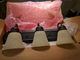 Oil rubbed bronze vanity light