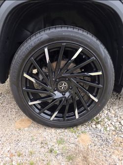 Black Multi-Spoke Alloy Wheel with Capricorn UHP Tire