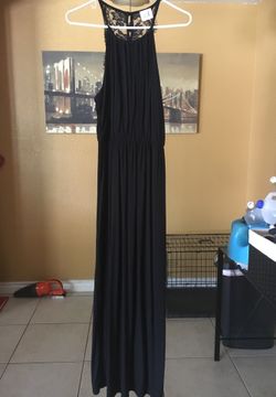 Black maxi dress. Crotchet back size small. Brand is “saved by the dress”