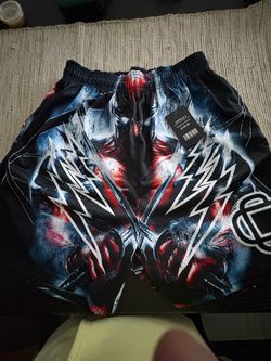 2XL Corruptive Creative , size black/red Deadpool graphic with lightning bolts and a stylized 'e' logo
