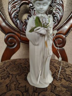 White Bisque Porcelain Child Figurine with Flowers