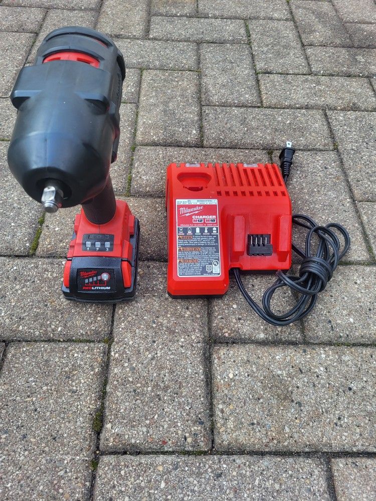 Milwaukee tools impact wrench battery and charger 3/8 everything all work