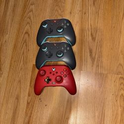 Three Xbox one Controllers