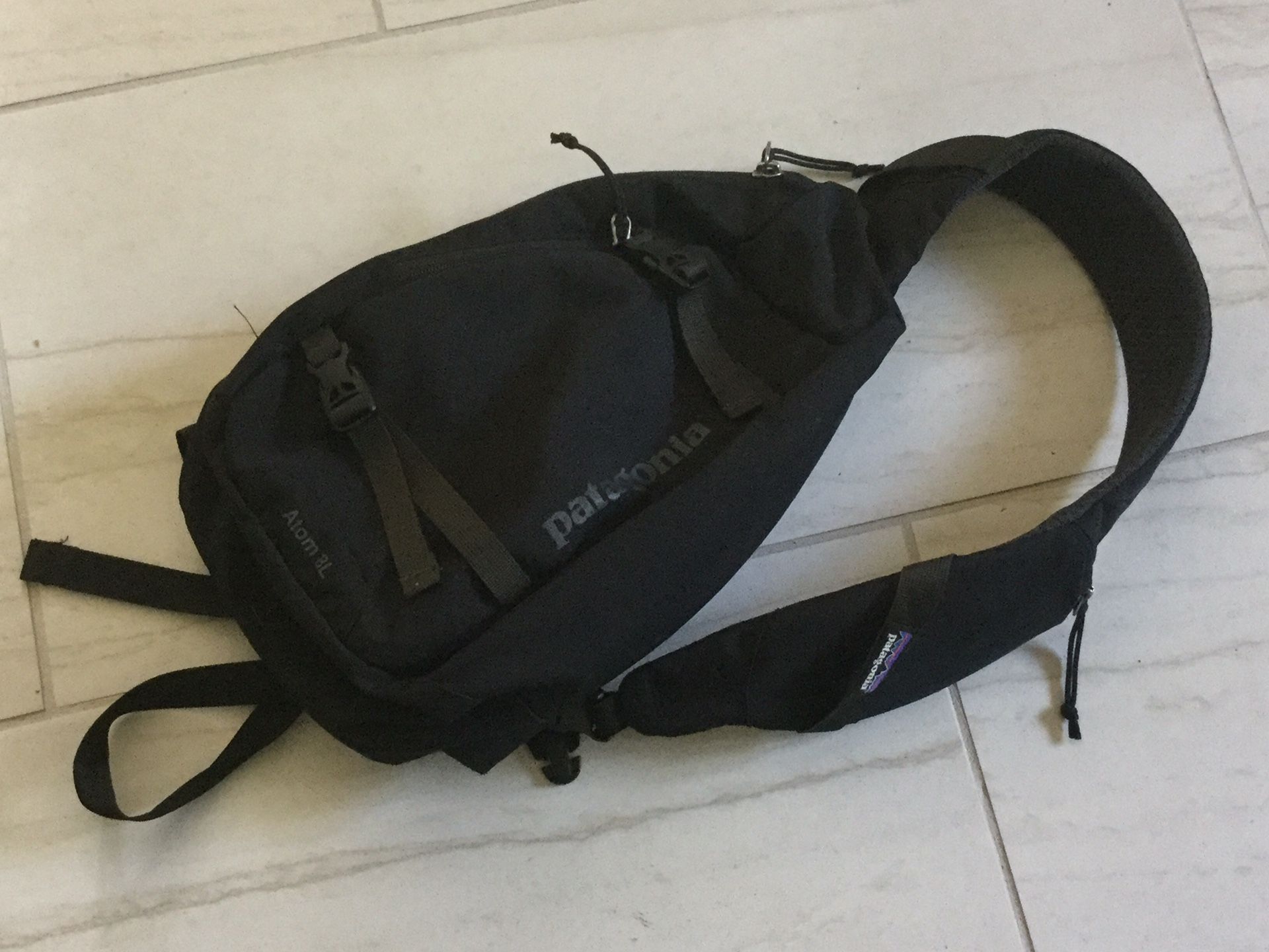 New Patagonia sling backpack Black nylon purse