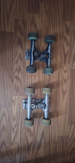 Skateboard trucks with wheels
