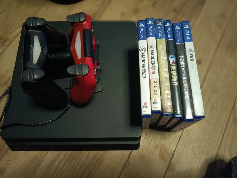 PS4 SLIM 2 REMOTES 4 GAMES (Price Is Negotiable)