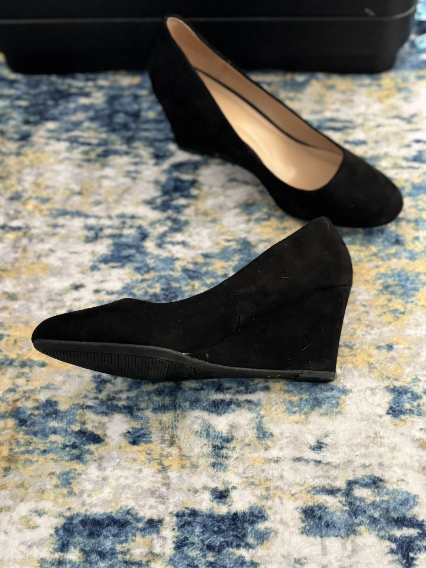 Stylish black wedge shoes