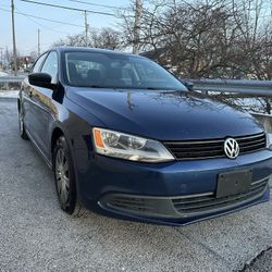 VW Jetta, Blue, Sedan