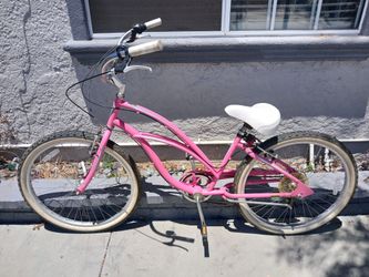 Women's 26" pink Electra 7 speed beach cruiser