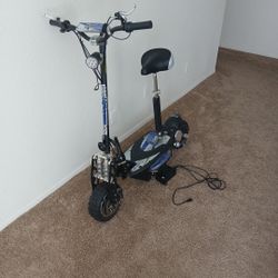 Uber Scoot  Great Condition  Original 1000  No Battery  With Charger 