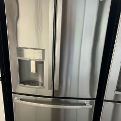 NEW OPEN BOX GE FRENCH STYLE STAINLESS STEEL REFRIGERATOR 