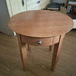 wooden side table, metal hardware. 