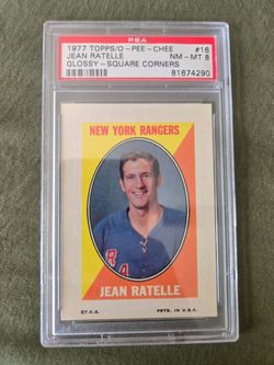 JEAN RATELLE 1977 Topps/O-Pee-Chee "Glossy-Square Corners" #16 PSA Graded Card NM-MT 8 NHL New York Rangers