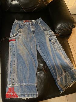 JNCO Vintage denim jeans with red accents and multiple pockets size 34w 32 L. $250 Located Mount Dora Fla 32757