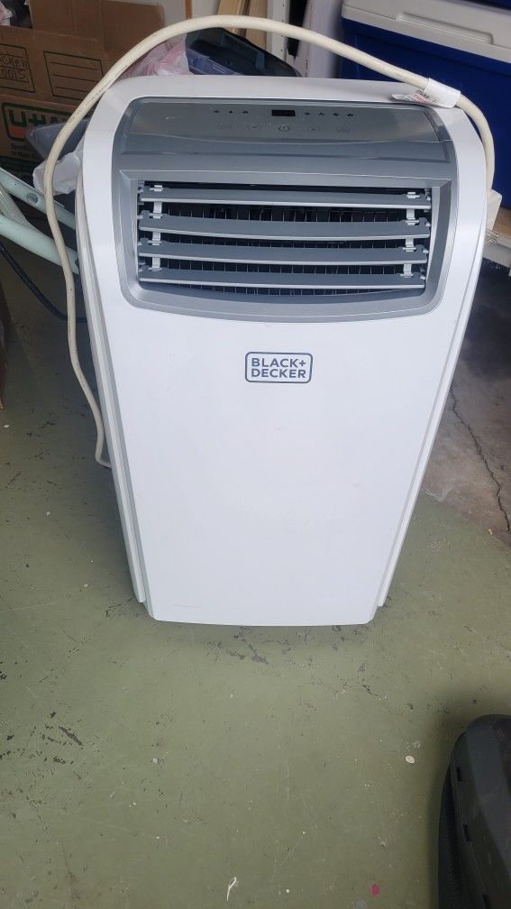 12,000 BTU Air Conditioner, Like New. Used Maybe 4 Times.