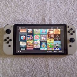 NINTENDO SWITCH OLED MODDED with 100 SWITCH GAMES and Over 7000 CLASSIC OLD SCHOOL HAMES