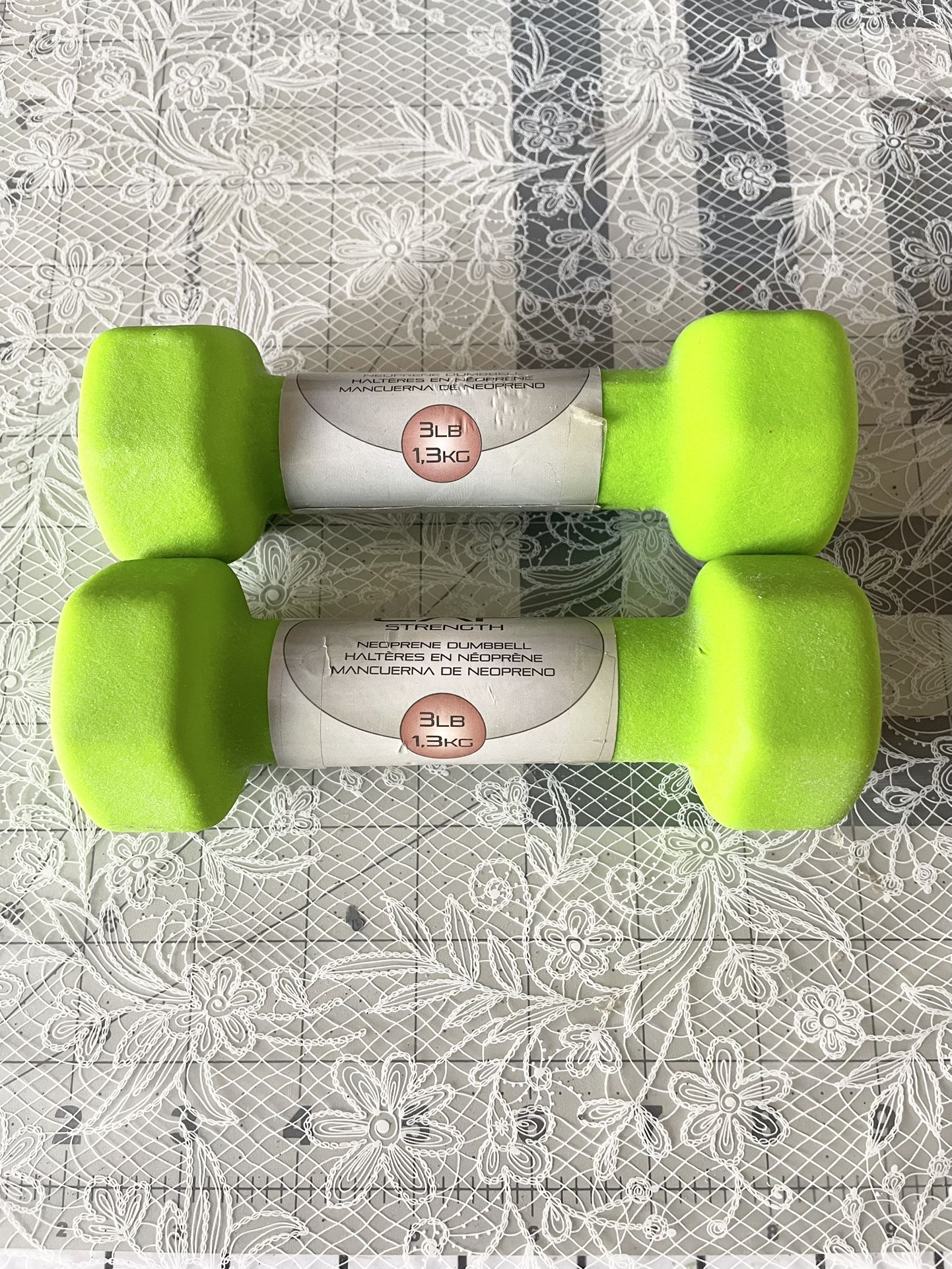 3lb Bright neon green dumbbells.