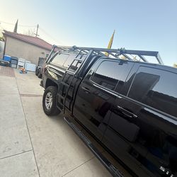 2015 Silverado camper and work rack for sale