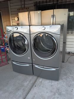 Whirlpool Front Load Washer and Electric Dryer