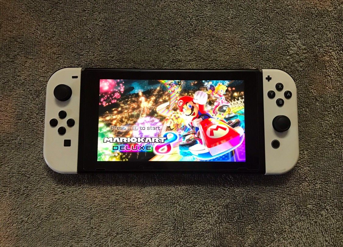 Switch V2 with 512gb and 120 Switch Games