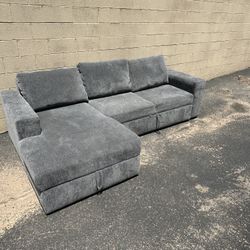 Living Spaces Sebastian Sleeper 2 Piece Sectional w/ Storage Chaise – Left Arm Facing