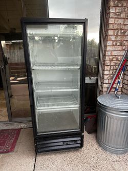 commercial-style True glass door refrigerator