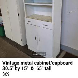 Vintage metal pantry cabinet