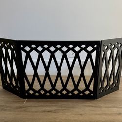 This is an Etna 3-Panel Diamond Design freestanding black wood pet gate