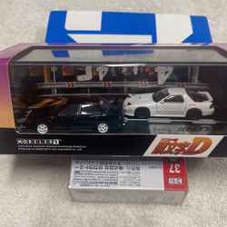 1:64 Modelers Initial D Rx7 White & Mitsubishi Lancer Evil Black 