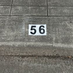I will paint your house number on your curb