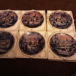 Set Of Six Bradford Exchange Christmas In The Village Collection Plates.