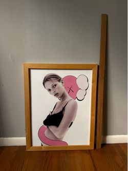 Framed "Kate Moss x KAWS" poster